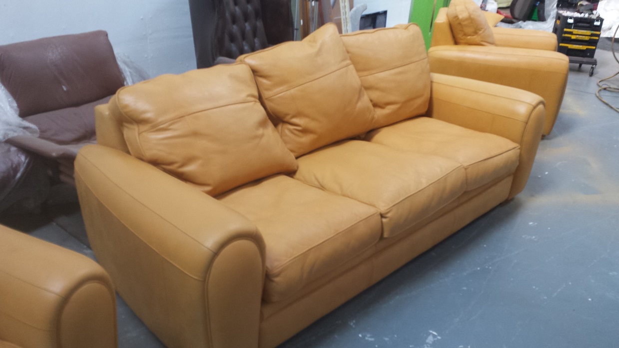 3 seat sofa of suite badly sun faded now restored