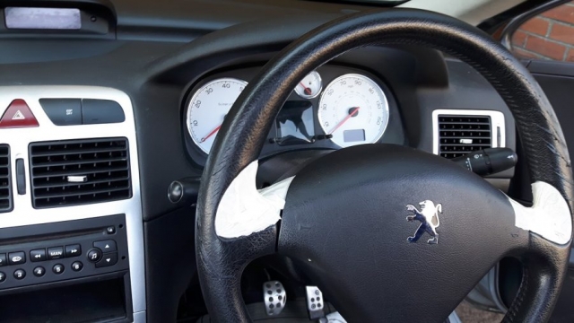 Damaged Peugeot Steering Wheel